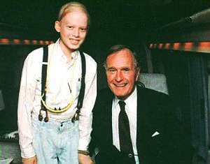 Erik with George Bush, Sr. on the Presidential Helicopter